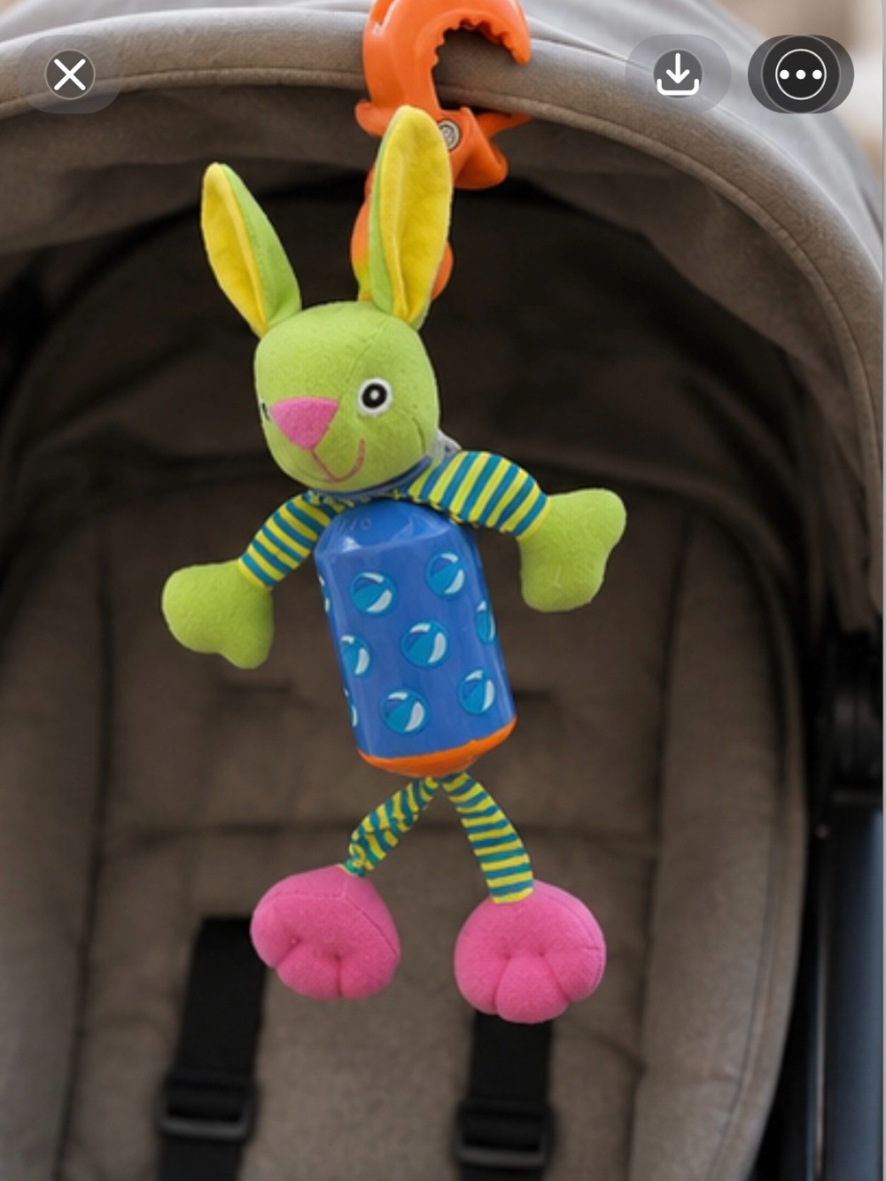 Green Bunny Stroller Toy with Blue Rattle and Pink Feet